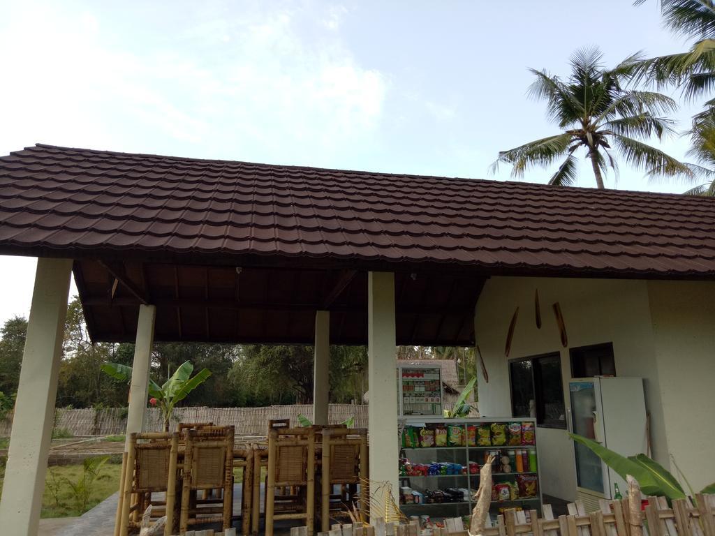 Отель Rose Bungalow Pemenang Экстерьер фото
