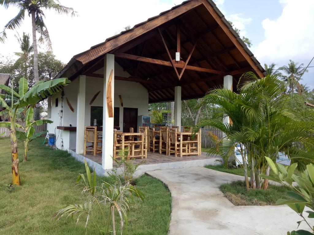 Отель Rose Bungalow Pemenang Экстерьер фото