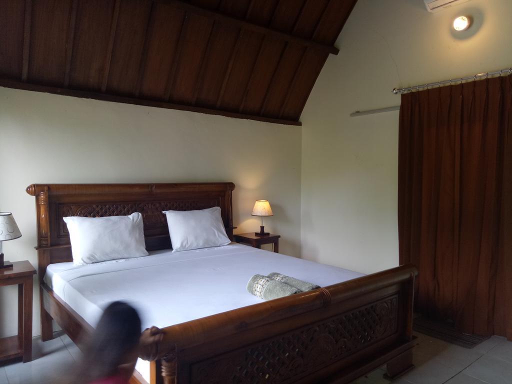 Отель Rose Bungalow Pemenang Экстерьер фото
