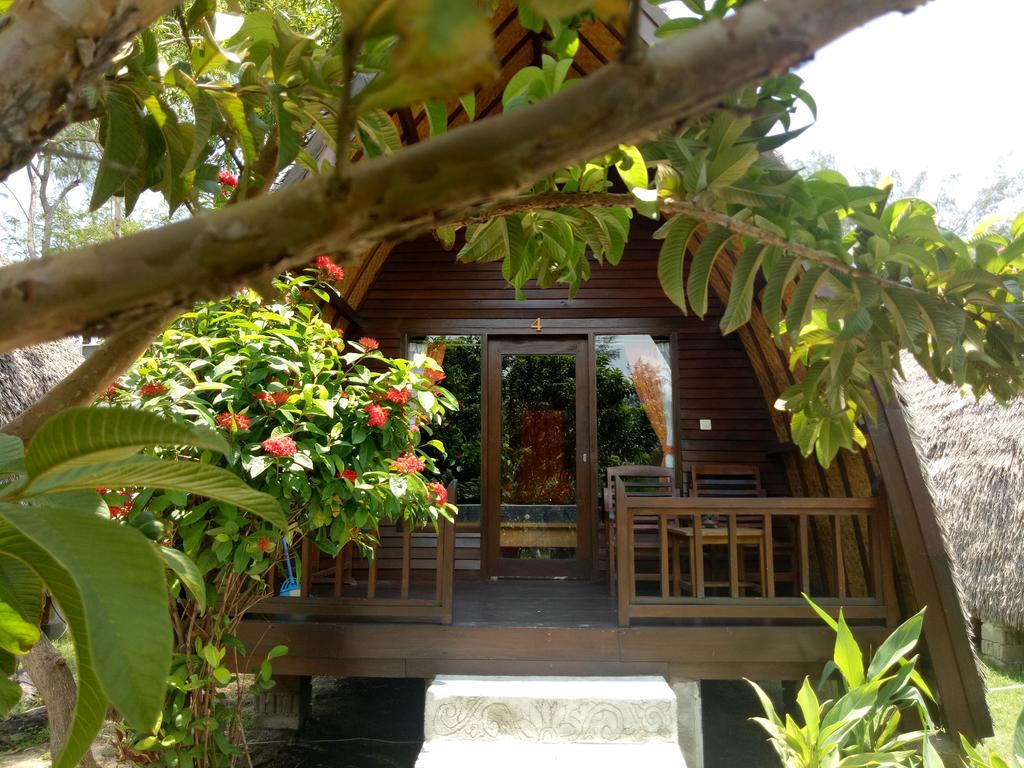 Отель Rose Bungalow Pemenang Экстерьер фото