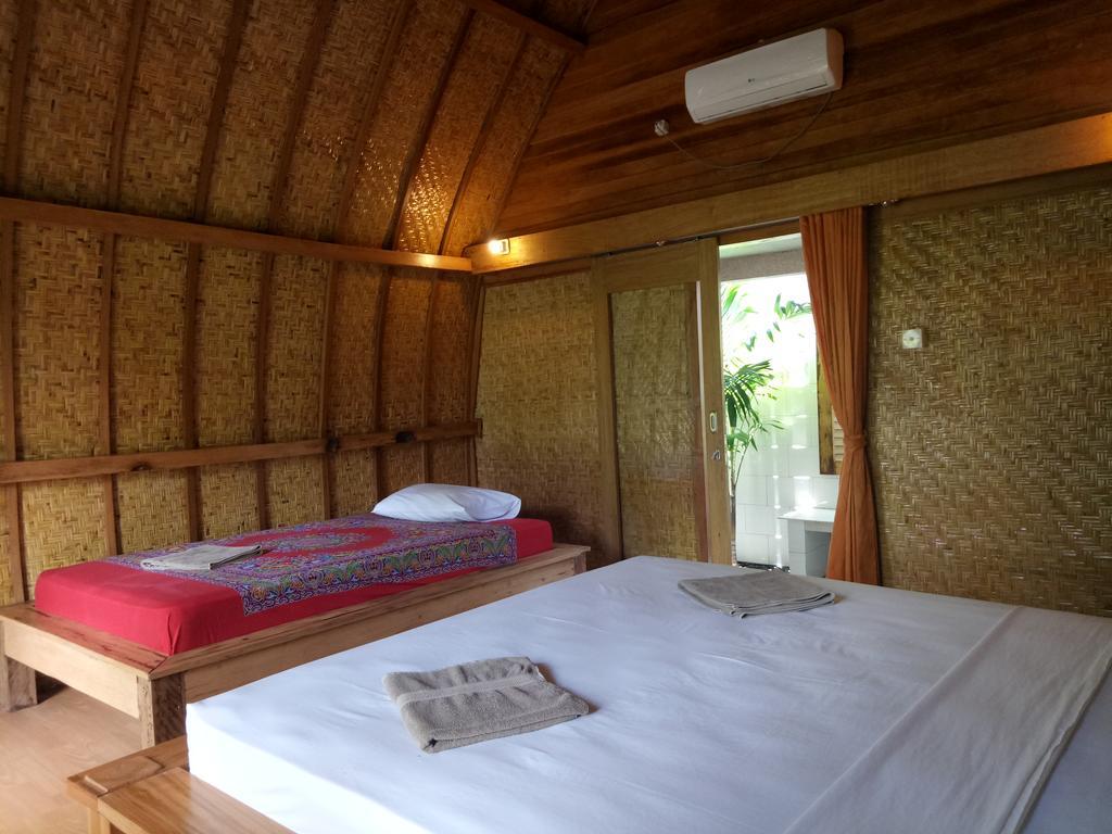 Отель Rose Bungalow Pemenang Экстерьер фото