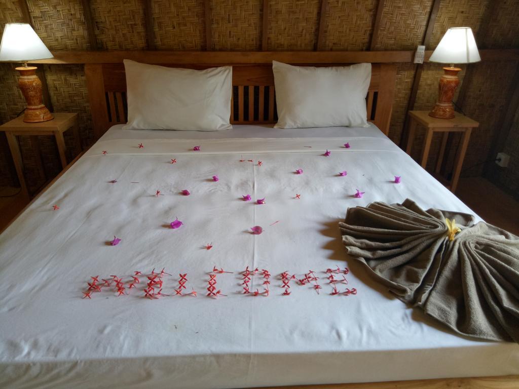 Отель Rose Bungalow Pemenang Экстерьер фото