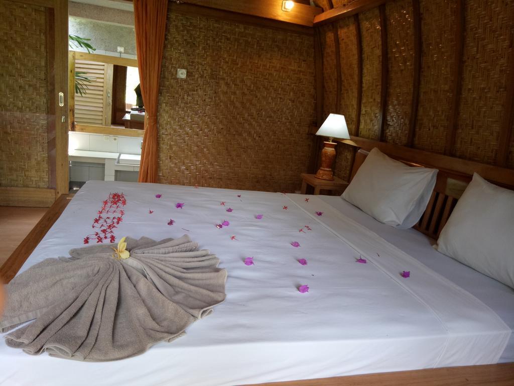 Отель Rose Bungalow Pemenang Экстерьер фото