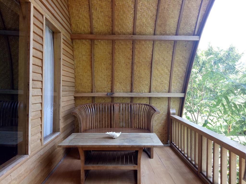 Отель Rose Bungalow Pemenang Экстерьер фото