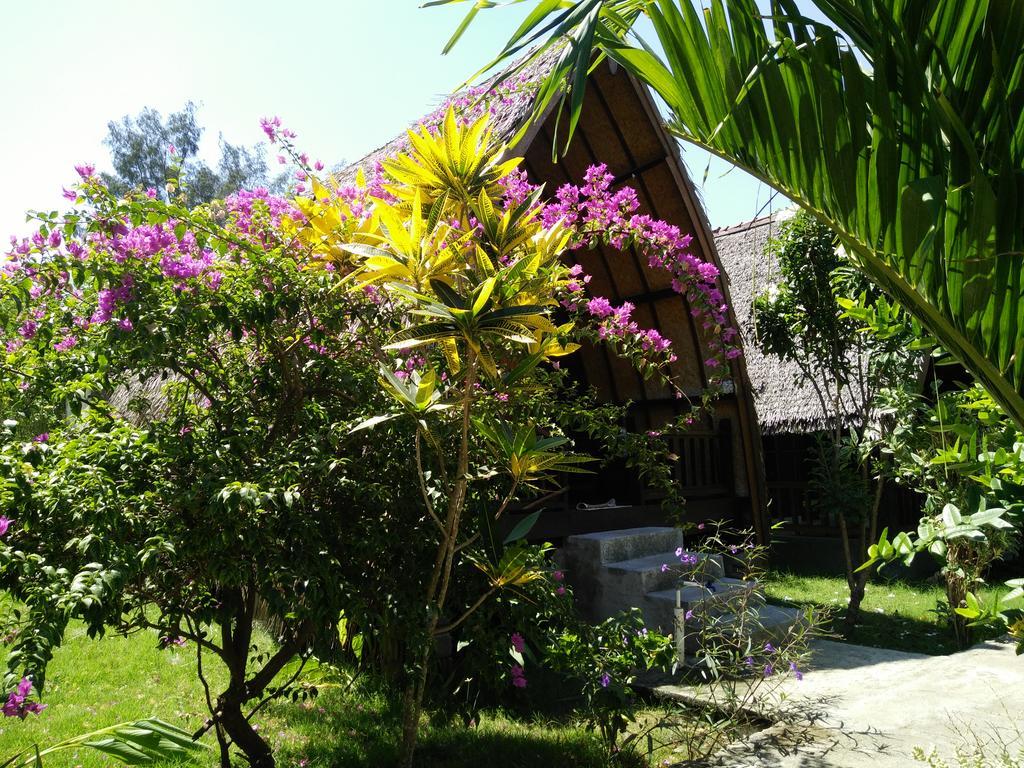Отель Rose Bungalow Pemenang Экстерьер фото