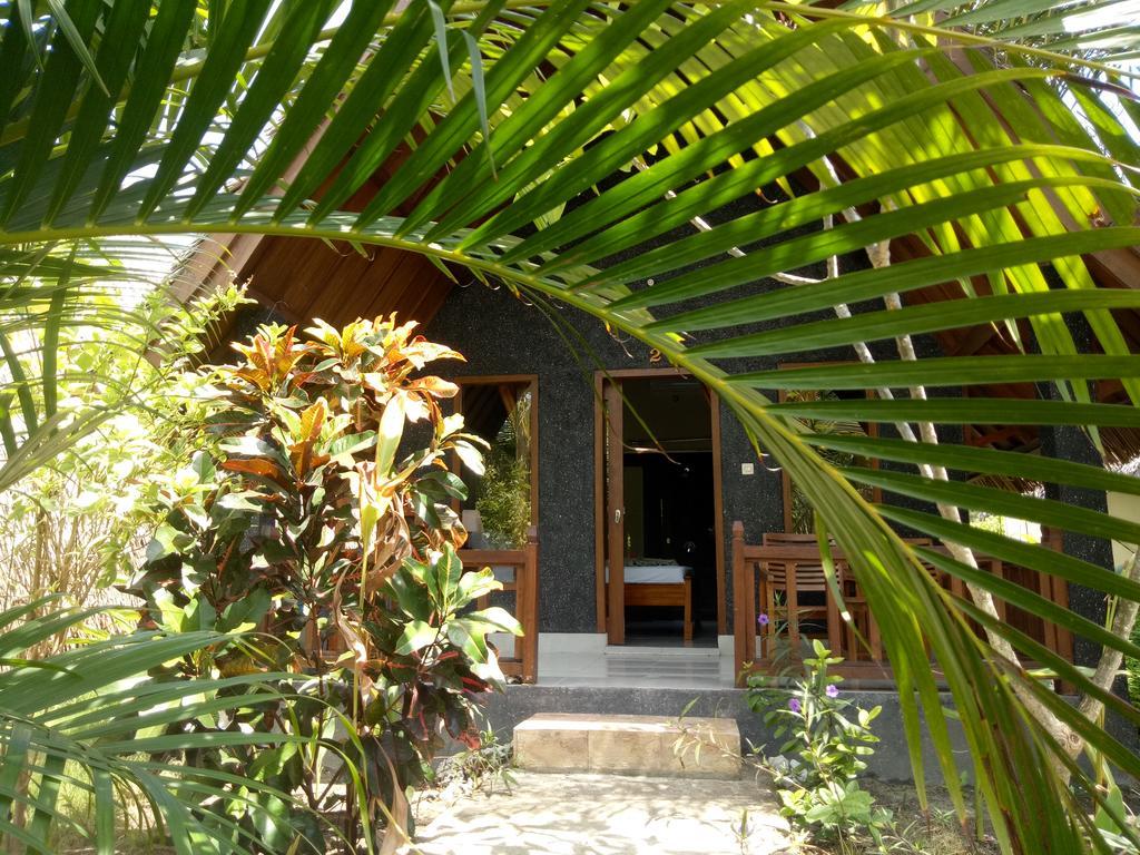 Отель Rose Bungalow Pemenang Экстерьер фото