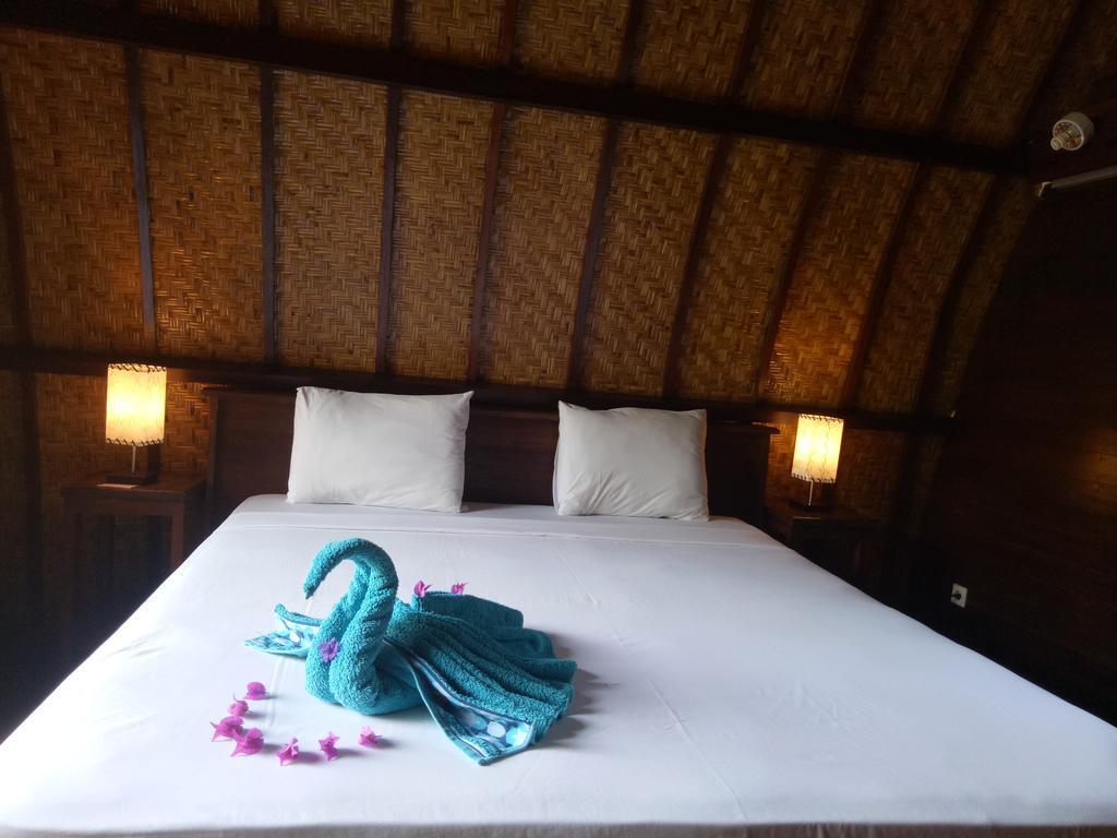 Отель Rose Bungalow Pemenang Экстерьер фото